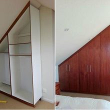 A Custom Bedroom Cupboard designed to fit a slanted ceiling